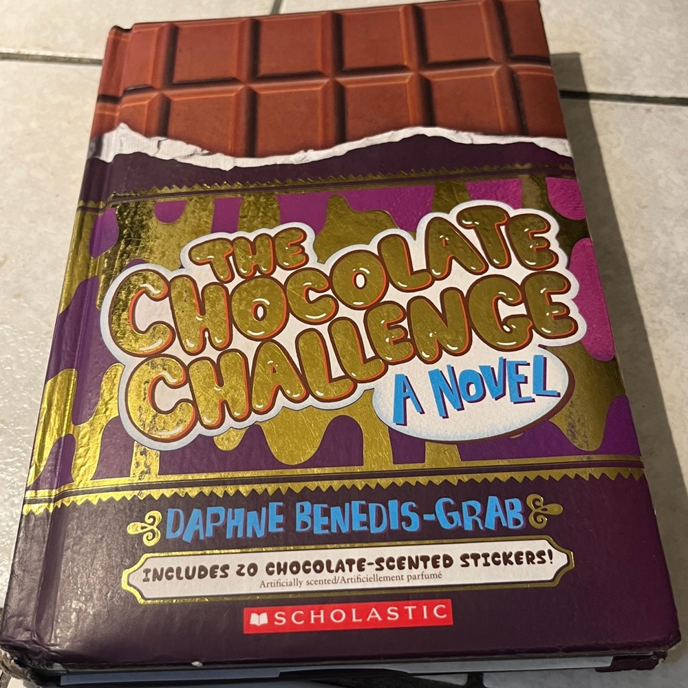 The Chocolate Challenge A Novel Includes 20 chocolate Scented stickers . Book
